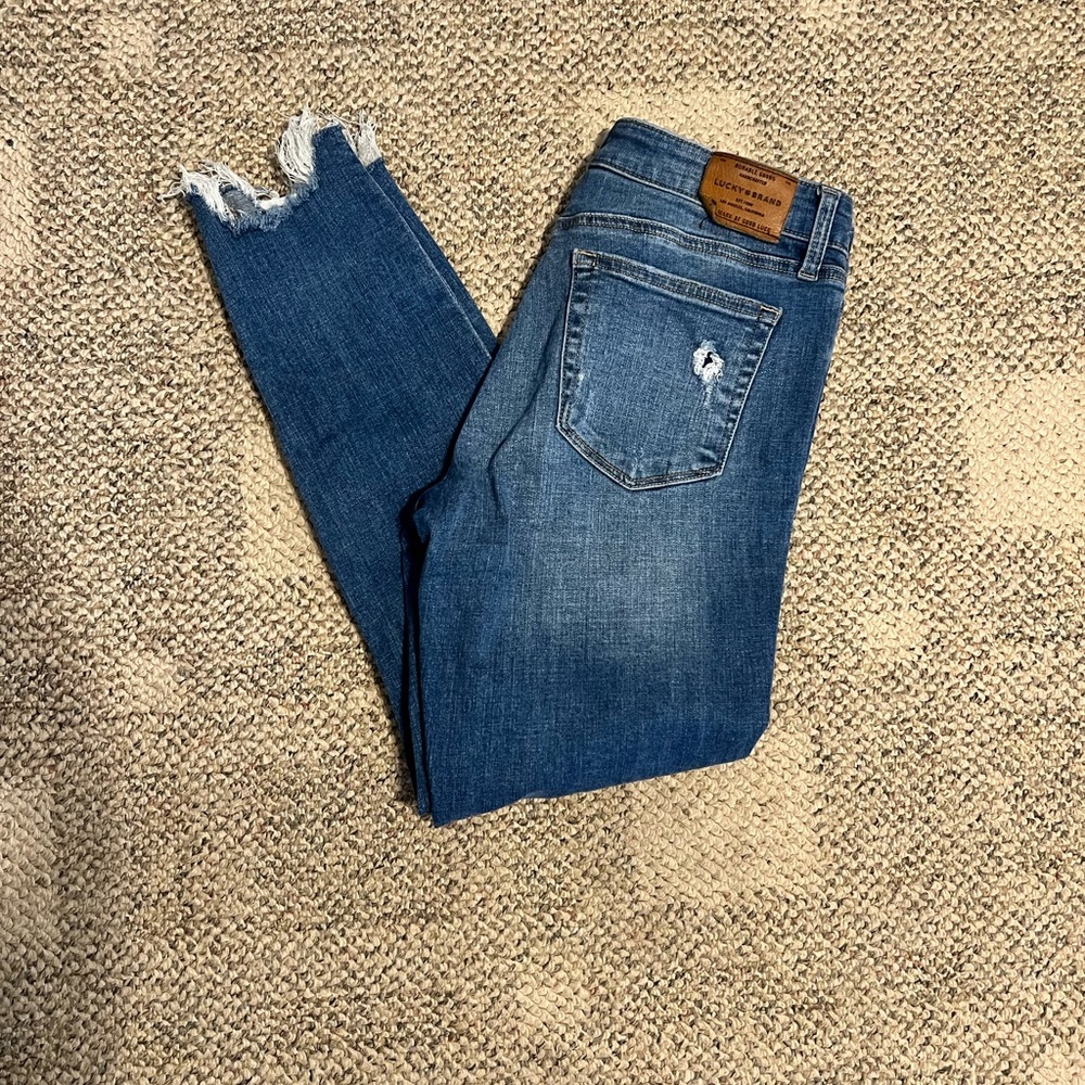 Lucky mid waisted distressed jeans